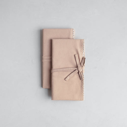 Cotton napkins with embroidered trim